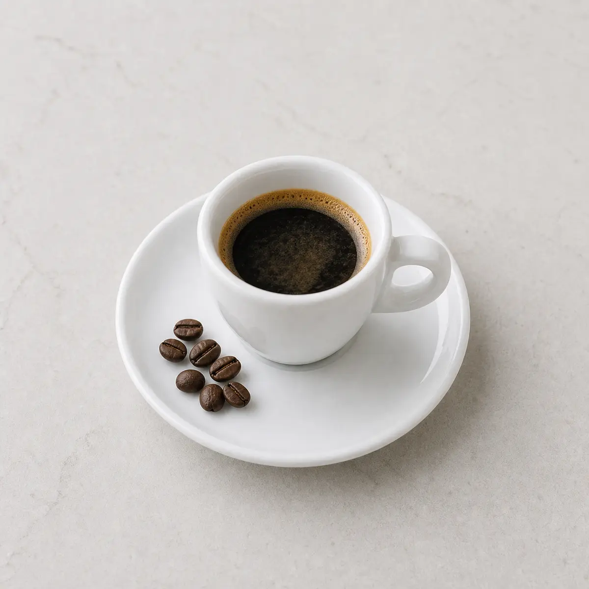Small espresso cup with coffee beans