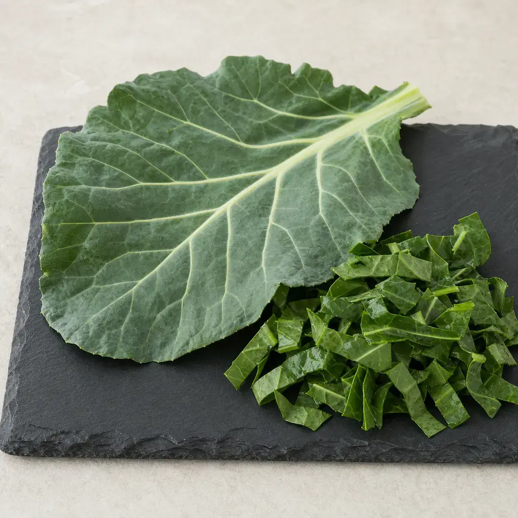 Plain collard greens on a clean unbranded surface for a reptile food-safety check.