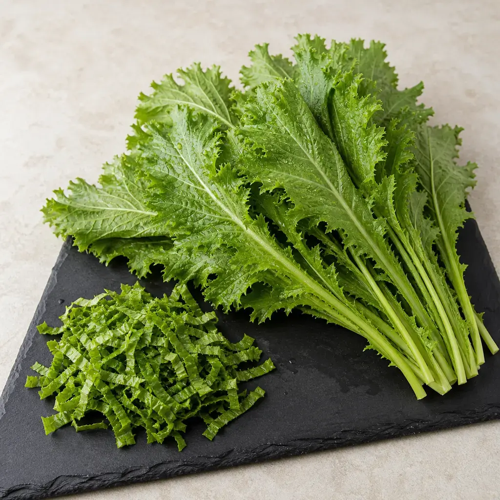 Plain mustard greens on a clean unbranded surface for a reptile food-safety check.